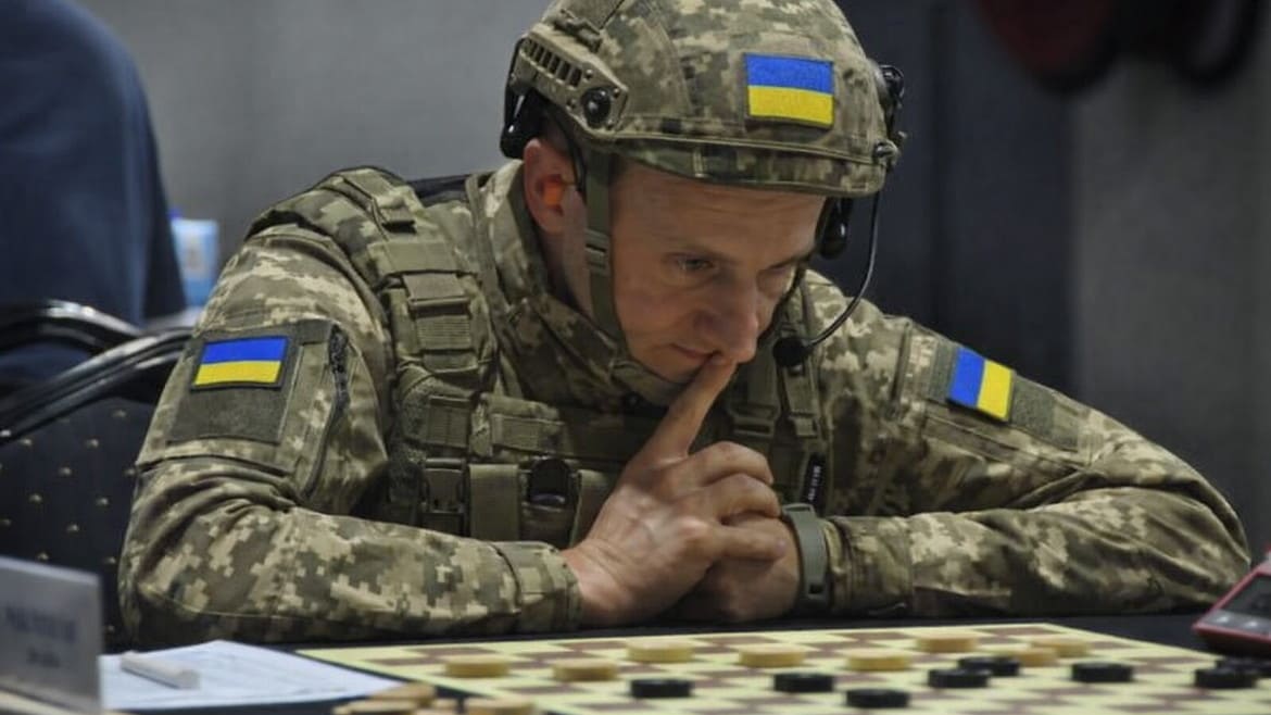 World Champion at War – The FMJD President Dines with Putin’s Cronies